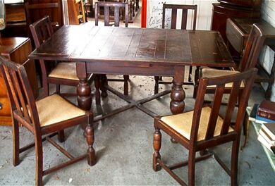 Draw-Leaf_Table_(Oak)_(with_Set_of_6_Chairs).jpg